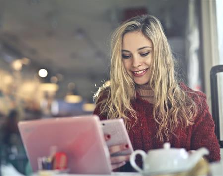 BillerDirect Woman Paying Bills on Phone